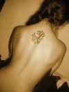 girl with om tattoo